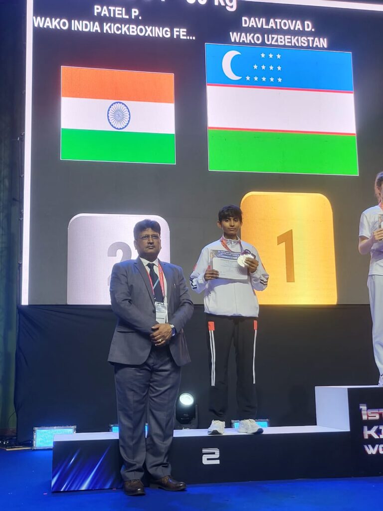 Thailand Sports Events : बनारस की बेटी पूजा पटेल बनीं पहली वर्ल्ड कप किकबॉक्सिंग की उपविजेता, देश को दिलाया रजत पदक Thailand Sports Events : बनारस की बेटी पूजा पटेल बनीं पहली वर्ल्ड कप किकबॉक्सिंग की उपविजेता, देश को दिलाया रजत पदक Thailand Sports Events : बनारस की बेटी पूजा पटेल बनीं पहली वर्ल्ड कप किकबॉक्सिंग की उपविजेता, देश को दिलाया रजत पदक